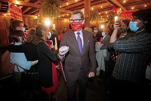 JOHN WOODS / WINNIPEG FREE PRESS Doug Eyolfson, Liberal candidate in Charleswood-St James-Assiniboia-Headingley, during a party at their restaurant location, the Cork and Flame on Portage Avenue, in Winnipeg Monday, September 20, 2021. 

Reporter: Katie