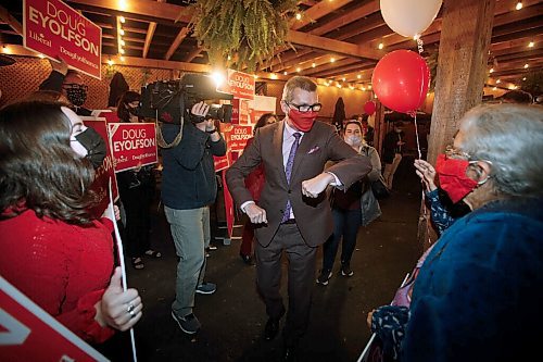 JOHN WOODS / WINNIPEG FREE PRESS Doug Eyolfson, Liberal candidate in Charleswood-St James-Assiniboia-Headingley, during a party at their restaurant location, the Cork and Flame on Portage Avenue, in Winnipeg Monday, September 20, 2021. 

Reporter: Katie