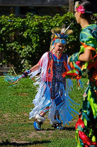 MIKE DEAL / WINNIPEG FREE PRESS
Mak Kennedy, 8, dances during the mini pop-up 2S Powwow in Broadway Neighbourhood Park Wednesday afternoon.
210922 - Wednesday, September 22, 2021.