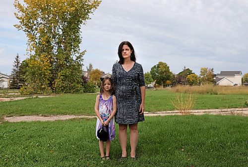 JESSICA LEE / WINNIPEG FREE PRESS

Audrey VanderSpek stands with daughter Lara VanderSpek on September 23, 2021 at the corner of Gull Lake Road and Markham Road where a new residential development is being planned. VanderSpek opposes the development, saying it is too high and will cast a shadow on nearby residential properties. She also says it will increase population density and cause a lack of parking and lack of spaces at the school nearby.

Reporter: Joyanne