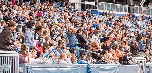 MIKE SUDOMA / Winnipeg Free Press
Bisons fans cheer in the stands after a bisons touch down during the first half of the Bisons home opener Saturday
September 25, 2021