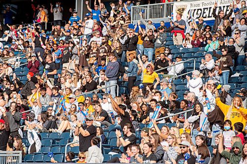 MIKE SUDOMA / WINNIPEG FREE PRESS
Bisons fans cheer in the stands after Bison Defence, Brock Gowanlock ran in a touchdown during their home opener against the University of Regina Rams Saturday afternoon
September 25, 2021