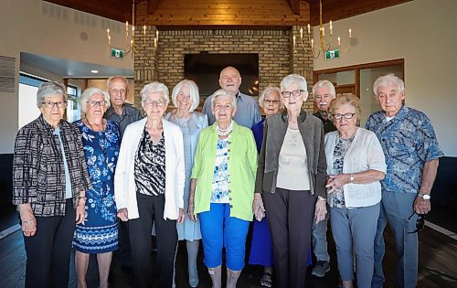 JESSICA LEE / WINNIPEG FREE PRESS

14 friends of Club 56 on September 22, 2021 at Larters at St. Andrews Golf and Country Club on the very last meeting. From left to right: Frieda Peters, Adita Sukkau, John Sukkau, Martha Neufeld, Eleonore Esau, Verna Froese, Henry Esau, Vanita Schmidt, Esther Braun, Victor Schmidt, Sylvia Martens and George Martens.

In 1956, 14 couples from Winnipeg married and formed a club they called Club 56. They have been meeting every year since 1956, however this meeting is their last meeting because the members are aging and some have moved out of the province. The original group of 28 is now a group of 14 as some members have passed away or moved out of province.

Reporter: Ben