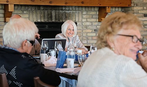 JESSICA LEE / WINNIPEG FREE PRESS

Eleonore Esau, centre, laughs at a joke on September 22, 2021 at Larters at St. Andrews Golf and Country Club during the last Club 56 meet-up.

In 1956, 14 couples from Winnipeg married and formed a club they called Club 56. They have been meeting every year since 1956, however this meeting is their last meeting because the members are aging and some have moved out of the province. The original group of 28 is now a group of 14 as some members have passed away or moved out of province.

Reporter: Ben