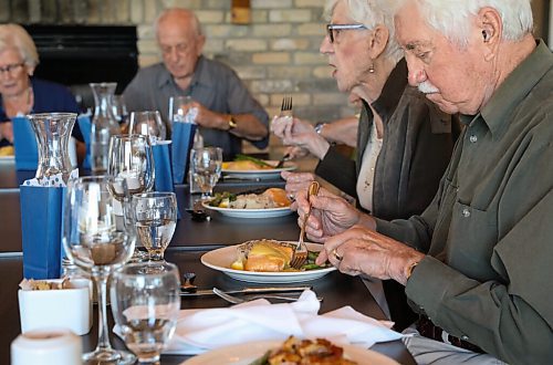 JESSICA LEE / WINNIPEG FREE PRESS

Victor Schmidt, right, digs into his lunch on September 22, 2021 at Larters at St. Andrews Golf and Country Club during the last Club 56 meet-up.

In 1956, 14 couples from Winnipeg married and formed a club they called Club 56. They have been meeting every year since 1956, however this meeting is their last meeting because the members are aging and some have moved out of the province. The original group of 28 is now a group of 14 as some members have passed away or moved out of province.

Reporter: Ben