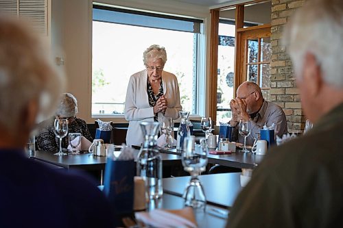 JESSICA LEE / WINNIPEG FREE PRESS

Martha Neufeld, centre, says a prayer before the meal on September 22, 2021 at Larters at St. Andrews Golf and Country Club during the last Club 56 meet-up.

In 1956, 14 couples from Winnipeg married and formed a club they called Club 56. They have been meeting every year since 1956, however this meeting is their last meeting because the members are aging and some have moved out of the province. The original group of 28 is now a group of 14 as some members have passed away or moved out of province.

Reporter: Ben