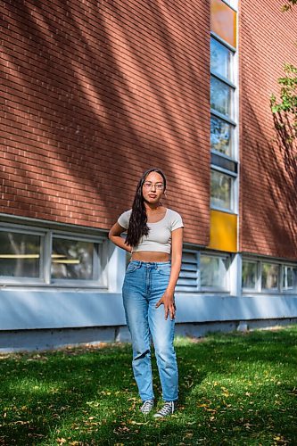 MIKAELA MACKENZIE / WINNIPEG FREE PRESS

Miyawata Stout, who responded to the bullet point in poll that her generation has much better idea of hope for their lives than previous generations, poses for a portrait in front of Kelvin High School in Winnipeg on Monday, Sept. 27, 2021. For --- story.
Winnipeg Free Press 2021.