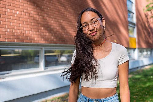 MIKAELA MACKENZIE / WINNIPEG FREE PRESS

Miyawata Stout, who responded to the bullet point in poll that her generation has much better idea of hope for their lives than previous generations, poses for a portrait in front of Kelvin High School in Winnipeg on Monday, Sept. 27, 2021. For --- story.
Winnipeg Free Press 2021.