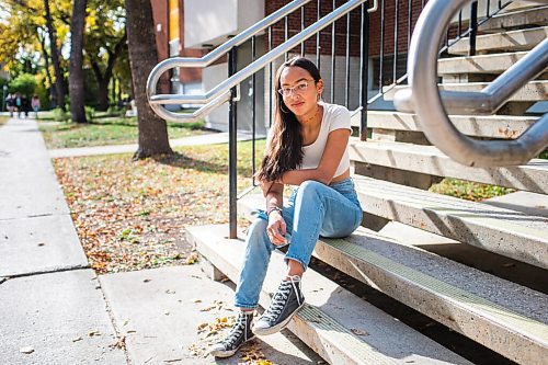 MIKAELA MACKENZIE / WINNIPEG FREE PRESS

Miyawata Stout, who responded to the bullet point in poll that her generation has much better idea of hope for their lives than previous generations, poses for a portrait in front of Kelvin High School in Winnipeg on Monday, Sept. 27, 2021. For --- story.
Winnipeg Free Press 2021.