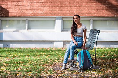 MIKAELA MACKENZIE / WINNIPEG FREE PRESS

Miyawata Stout, who responded to the bullet point in poll that her generation has much better idea of hope for their lives than previous generations, poses for a portrait in front of Kelvin High School in Winnipeg on Monday, Sept. 27, 2021. For --- story.
Winnipeg Free Press 2021.