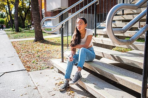 MIKAELA MACKENZIE / WINNIPEG FREE PRESS

Miyawata Stout, who responded to the bullet point in poll that her generation has much better idea of hope for their lives than previous generations, poses for a portrait in front of Kelvin High School in Winnipeg on Monday, Sept. 27, 2021. For --- story.
Winnipeg Free Press 2021.