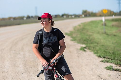 MIKAELA MACKENZIE / WINNIPEG FREE PRESS

Evan McRae, 13, bikes out to shoot photos and record video of trains east of Symington Yards in Winnipeg on Monday, Sept. 27, 2021.  For the last two years, the young rail fan has been going out to watch trains around the city. For --- story.
Winnipeg Free Press 2021.