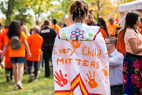 MIKAELA MACKENZIE / WINNIPEG FREE PRESS

Riley Brown watches as the march comes into St. John's Park on the first National Day for Truth and Reconciliation in Winnipeg on Thursday, Sept. 30, 2021. For --- story.
Winnipeg Free Press 2021.