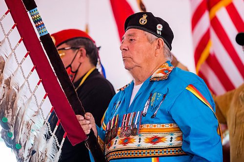 MIKAELA MACKENZIE / WINNIPEG FREE PRESS

Floyd Sutherland carries an eagle staff in the grand entry at a Pow Wow at St. John's Park on the first National Day for Truth and Reconciliation in Winnipeg on Thursday, Sept. 30, 2021. For --- story.
Winnipeg Free Press 2021.