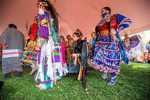 MIKAELA MACKENZIE / WINNIPEG FREE PRESS

Anastasia Hudson (five, centre) and Destiny Thompson (right) dance at a Pow Wow at St. John's Park on the first National Day for Truth and Reconciliation in Winnipeg on Thursday, Sept. 30, 2021. For --- story.
Winnipeg Free Press 2021.