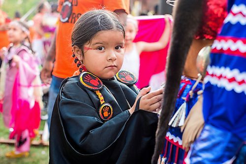 MIKAELA MACKENZIE / WINNIPEG FREE PRESS

Anastasia Hudson (five) plays at a Pow Wow at St. John's Park on the first National Day for Truth and Reconciliation in Winnipeg on Thursday, Sept. 30, 2021. For --- story.
Winnipeg Free Press 2021.