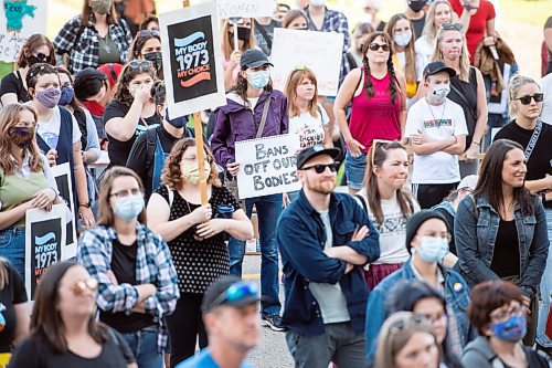 MIKE SUDOMA / Winnipeg Free Press
Womens rights advocates hold up signs on the grounds of the Manitoba Legislature Saturday afternoon
October 2, 2021