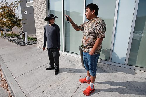 JOHN WOODS / WINNIPEG FREE PRESS
Corey Keeper, left, and his uncle Sheldon, from Pauingasi, talk to media about returning home in Winnipeg Sunday, October 3, 2021. Families evacuated from Little Grand Rapids and Pauingassi because of fire have been told they can return home.

Reporter: Piche