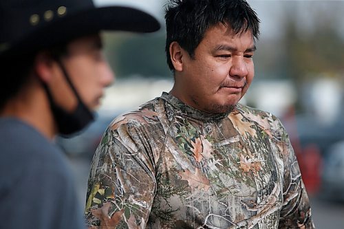 JOHN WOODS / WINNIPEG FREE PRESS
Corey Keeper, left, and his uncle Sheldon, from Pauingasi, talk to media about returning home in Winnipeg Sunday, October 3, 2021. Families evacuated from Little Grand Rapids and Pauingassi because of fire have been told they can return home.

Reporter: Piche