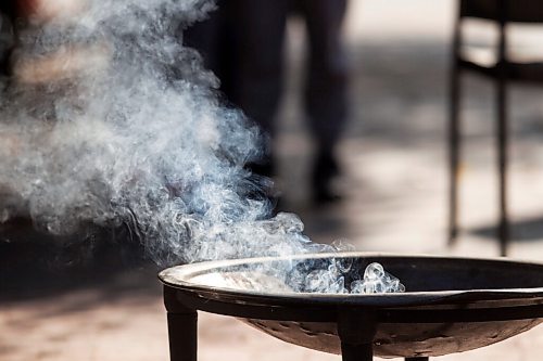 MIKAELA MACKENZIE / WINNIPEG FREE PRESS

A sacred fire is lit at City Hall in honour of a day of action and awareness for missing and murdered Indigenous women, girls, and two-spirited peoples in Winnipeg on Monday, Oct. 4, 2021. For --- story.
Winnipeg Free Press 2021.