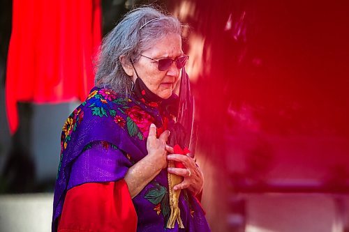 MIKAELA MACKENZIE / WINNIPEG FREE PRESS

Elder Carolyn Moar speaks at a sacred fire at City Hall in honour of a day of action and awareness for missing and murdered Indigenous women, girls, and two-spirited peoples in Winnipeg on Monday, Oct. 4, 2021. For --- story.
Winnipeg Free Press 2021.