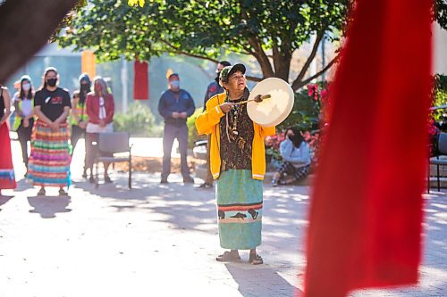 MIKAELA MACKENZIE / WINNIPEG FREE PRESS

Bev Jones sings an eagle song at a sacred fire at City Hall in honour of a day of action and awareness for missing and murdered Indigenous women, girls, and two-spirited peoples in Winnipeg on Monday, Oct. 4, 2021. For --- story.
Winnipeg Free Press 2021.