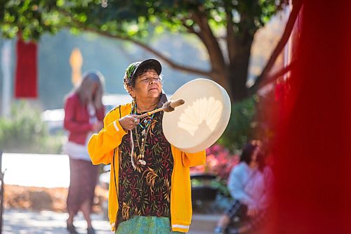 MIKAELA MACKENZIE / WINNIPEG FREE PRESS

Bev Jones sings an eagle song at a sacred fire at City Hall in honour of a day of action and awareness for missing and murdered Indigenous women, girls, and two-spirited peoples in Winnipeg on Monday, Oct. 4, 2021. For --- story.
Winnipeg Free Press 2021.