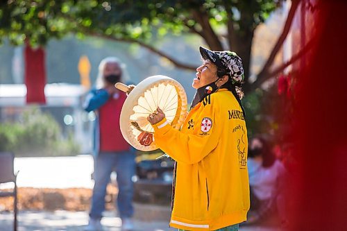 MIKAELA MACKENZIE / WINNIPEG FREE PRESS

Bev Jones sings an eagle song at a sacred fire at City Hall in honour of a day of action and awareness for missing and murdered Indigenous women, girls, and two-spirited peoples in Winnipeg on Monday, Oct. 4, 2021. For --- story.
Winnipeg Free Press 2021.