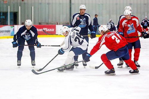 MIKE DEAL / WINNIPEG FREE PRESS
Manitoba Moose' Peter Krieger (26) trying to keep the puck away from Dean Stewart (2) during practice at MTS Iceplex Monday morning.
211004 - Monday, October 04, 2021.