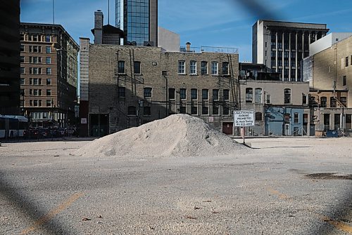 JESSICA LEE / WINNIPEG FREE PRESS

An empty plot of concrete and pile of rubble lie at the site of what was once the St. Regis Hotel on October 4, 2021. Sunshine Wood, was last seen there in 2004.

Reporter: Melissa



