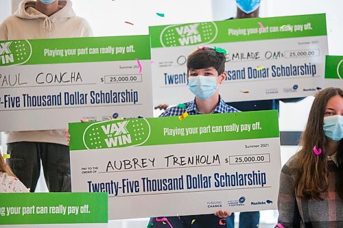 MIKAELA MACKENZIE / WINNIPEG FREE PRESS

Vax to Win scholarship winner Aubrey Trenholm poses in a group photo at the RBC Convention Centre vaccination supersite in Winnipeg on Tuesday, Oct. 5, 2021. For Gabby story.
Winnipeg Free Press 2021.