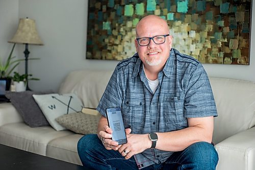 MIKAELA MACKENZIE / WINNIPEG FREE PRESS

Jason Lerato, former anti-vaxxer who has now changed his mind and gotten vaccinated, poses for a portrait in his home in Winnipeg on Tuesday, Oct. 5, 2021. For Malak story.
Winnipeg Free Press 2021.