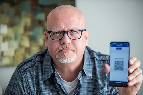 MIKAELA MACKENZIE / WINNIPEG FREE PRESS

Jason Lerato, former anti-vaxxer who has now changed his mind and gotten vaccinated, poses for a portrait in his home in Winnipeg on Tuesday, Oct. 5, 2021. For Malak story.
Winnipeg Free Press 2021.