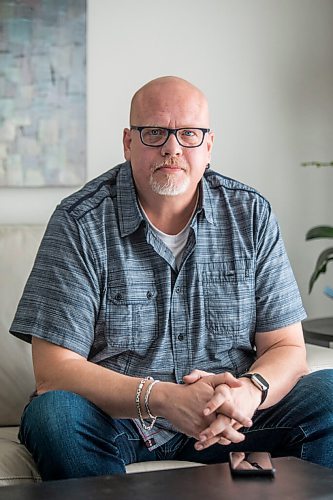 MIKAELA MACKENZIE / WINNIPEG FREE PRESS

Jason Lerato, former anti-vaxxer who has now changed his mind and gotten vaccinated, poses for a portrait in his home in Winnipeg on Tuesday, Oct. 5, 2021. For Malak story.
Winnipeg Free Press 2021.