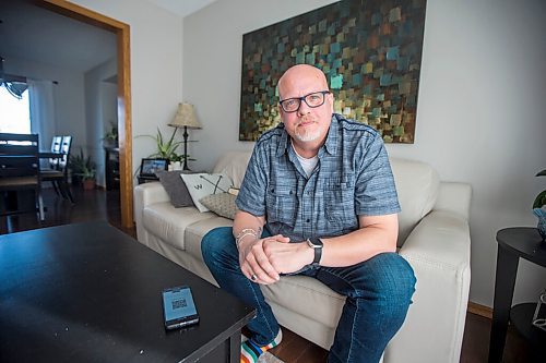 MIKAELA MACKENZIE / WINNIPEG FREE PRESS

Jason Lerato, former anti-vaxxer who has now changed his mind and gotten vaccinated, poses for a portrait in his home in Winnipeg on Tuesday, Oct. 5, 2021. For Malak story.
Winnipeg Free Press 2021.