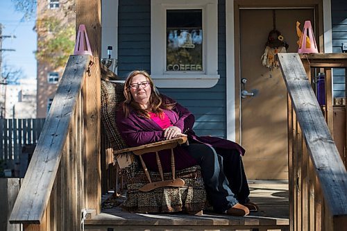 MIKAELA MACKENZIE / WINNIPEG FREE PRESS

Debby Sillito, who is living on employment and income assistance and applying for a low-income bus pass, poses for a portrait on her front porch in Winnipeg on Tuesday, Oct. 5, 2021. For Joyanne story.
Winnipeg Free Press 2021.