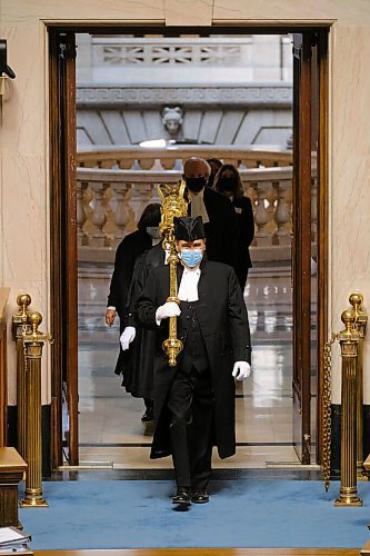 MIKE DEAL / WINNIPEG FREE PRESS
Sergeant-at-Arms, Dave Shuttleworth, carries the mace into the Chamber prior to the start of the 3rd Session of the 42nd Legislature, Wednesday afternoon.
Premier Kelvin Goertzen and Opposition leader Wab Kinew along with about two-thirds of the MLA's attend the start of a very short session of the legislative assembly Wednesday afternoon. There will be two more days this week and three next week before the end of the session so that the governing Conservative party can elect a new leader who will become the next Premier at the end of the month.
211006 - Wednesday, October 06, 2021.