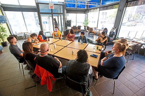 MIKE DEAL / WINNIPEG FREE PRESS
Participants listen to writer/filmmaker Sonya Ballantyne, in yellow, speak at the Winnipeg Free Press Reader Bridge Feeding the Conversation Lunch held at the Winnipeg Free Press News Cafe (237 McDermot Ave) Wednesday.
211006 - Wednesday, October 06, 2021.