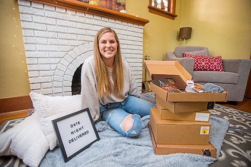 MIKAELA MACKENZIE / WINNIPEG FREE PRESS

Megan Parson, creator of Date Night Delivered (a date night in a box), poses for a portrait with some of her boxes in Winnipeg on Wednesday, Oct. 6, 2021. For Dave Sanderson story.
Winnipeg Free Press 2021.