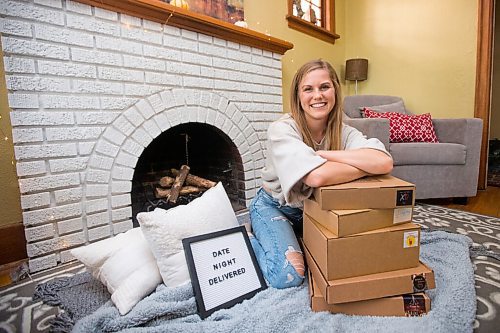 MIKAELA MACKENZIE / WINNIPEG FREE PRESS

Megan Parson, creator of Date Night Delivered (a date night in a box), poses for a portrait with some of her boxes in Winnipeg on Wednesday, Oct. 6, 2021. For Dave Sanderson story.
Winnipeg Free Press 2021.