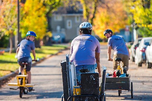 MIKAELA MACKENZIE / WINNIPEG FREE PRESS

Maraleigh Short (left), Shamaun Chowdhury, and Nathaniel De Avila of Velo Renovation (a home renovation collective that uses bicycles as their primary transportation) pose for a portrait in Winnipeg on Thursday, Oct. 7, 2021. For Dave Sanderson story.
Winnipeg Free Press 2021.