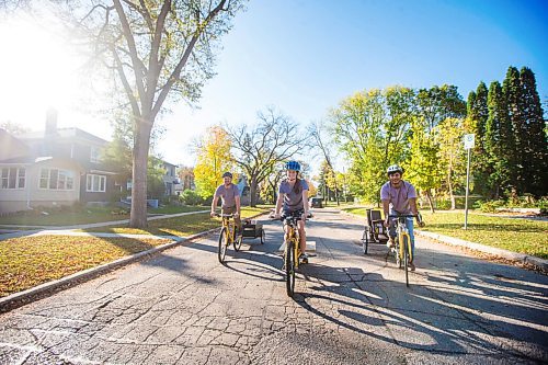 MIKAELA MACKENZIE / WINNIPEG FREE PRESS
Nathaniel De Avila (left), Maraleigh Short, and Shamaun Chowdhury of Velo Renovation (a home renovation collective that uses bicycles as their primary transportation) pose for a portrait in Winnipeg on Thursday, Oct. 7, 2021. For Dave Sanderson story.
Winnipeg Free Press 2021.