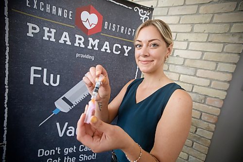 JOHN WOODS / WINNIPEG FREE PRESS
Jes Buhler, pharmacist at The Exchange District Pharmacy, is photographed in the pharmacy clinic in Winnipeg Thursday, October 7, 2021. Pharmacies have seen an increase in flu shots.

Reporter: Piche