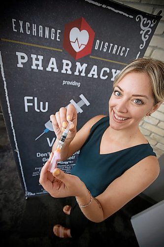 JOHN WOODS / WINNIPEG FREE PRESS
Jes Buhler, pharmacist at The Exchange District Pharmacy, is photographed in the pharmacy clinic in Winnipeg Thursday, October 7, 2021. Pharmacies have seen an increase in flu shots.

Reporter: Piche