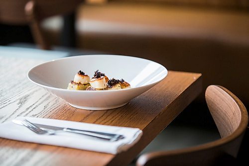 MIKAELA MACKENZIE / WINNIPEG FREE PRESS

Seared scallops and lo bak go at Nola, a new concept by chef Emily Butcher and Mike Del Buono of King and Bannatyne, in St. Boniface on Friday, Oct. 8, 2021. For Eva Wasney story.
Winnipeg Free Press 2021.