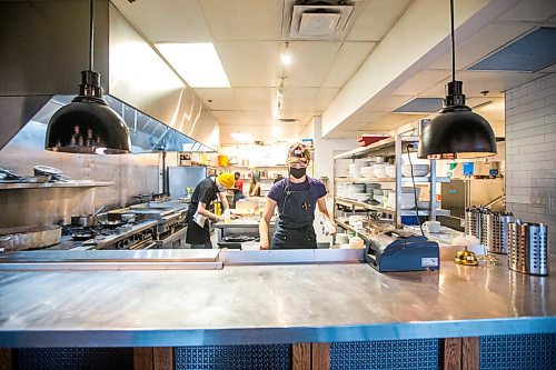 MIKAELA MACKENZIE / WINNIPEG FREE PRESS

Chef Emily Butcher prepares dishes at Nola, a new restaurant in St. Boniface, on Friday, Oct. 8, 2021. For Eva Wasney story.
Winnipeg Free Press 2021.