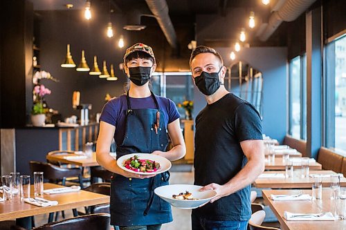 MIKAELA MACKENZIE / WINNIPEG FREE PRESS

Chef Emily Butcher and Mike Del Buono pose for a portrait with signature dishes at Nola, their new restaurant, in St. Boniface on Friday, Oct. 8, 2021. For Eva Wasney story.
Winnipeg Free Press 2021.