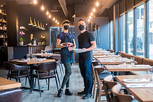 MIKAELA MACKENZIE / WINNIPEG FREE PRESS

Chef Emily Butcher and Mike Del Buono pose for a portrait with signature dishes at Nola, their new restaurant, in St. Boniface on Friday, Oct. 8, 2021. For Eva Wasney story.
Winnipeg Free Press 2021.