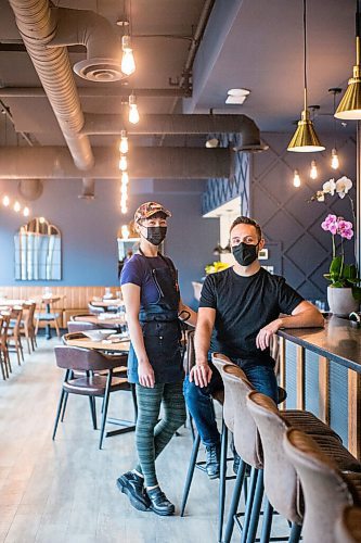 MIKAELA MACKENZIE / WINNIPEG FREE PRESS

Chef Emily Butcher and Mike Del Buono pose for a portrait with signature dishes at Nola, their new restaurant, in St. Boniface on Friday, Oct. 8, 2021. For Eva Wasney story.
Winnipeg Free Press 2021.