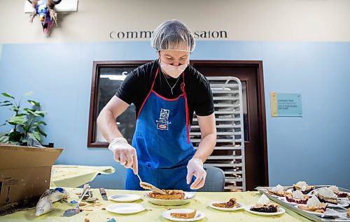 JESSICA LEE / WINNIPEG FREE PRESS

Dallas Holden, a staff member, divides up plates of pie at Siloam Mission on October 8, 2021. The organization fed dozens of community members Thanksgiving lunch earlier that day.

Reporter: Erik